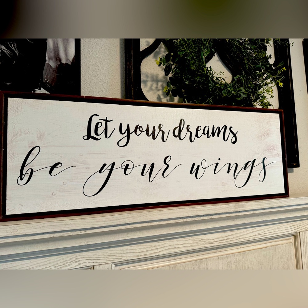 ‘Let your dreams be your wings’ sign